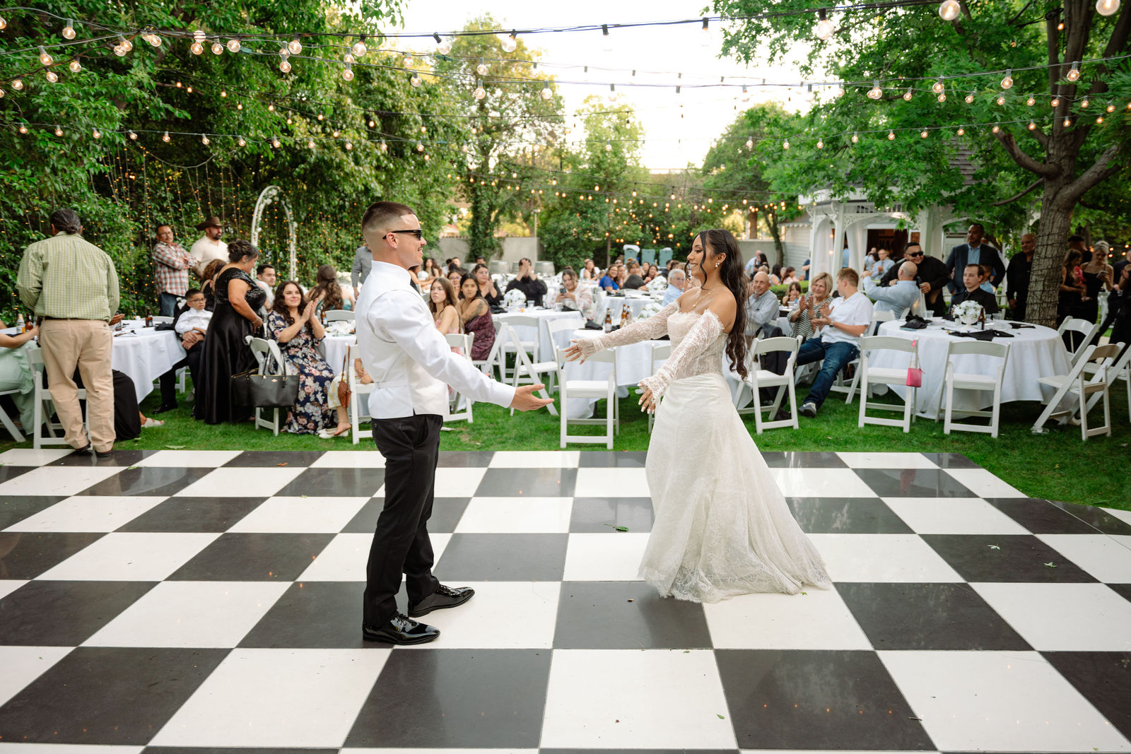 Bride and groom beginning their first dance at the reception